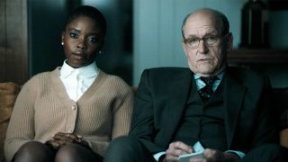 Joy Sunday on the left, Richard Jenkins on the right, both looking towards the camera in DTF St. Louis. 