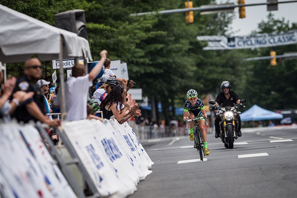 Lauren Stephens (TIBCO) all smiles on the way to the finish