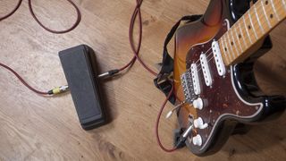 Wah pedal and an electric guitar