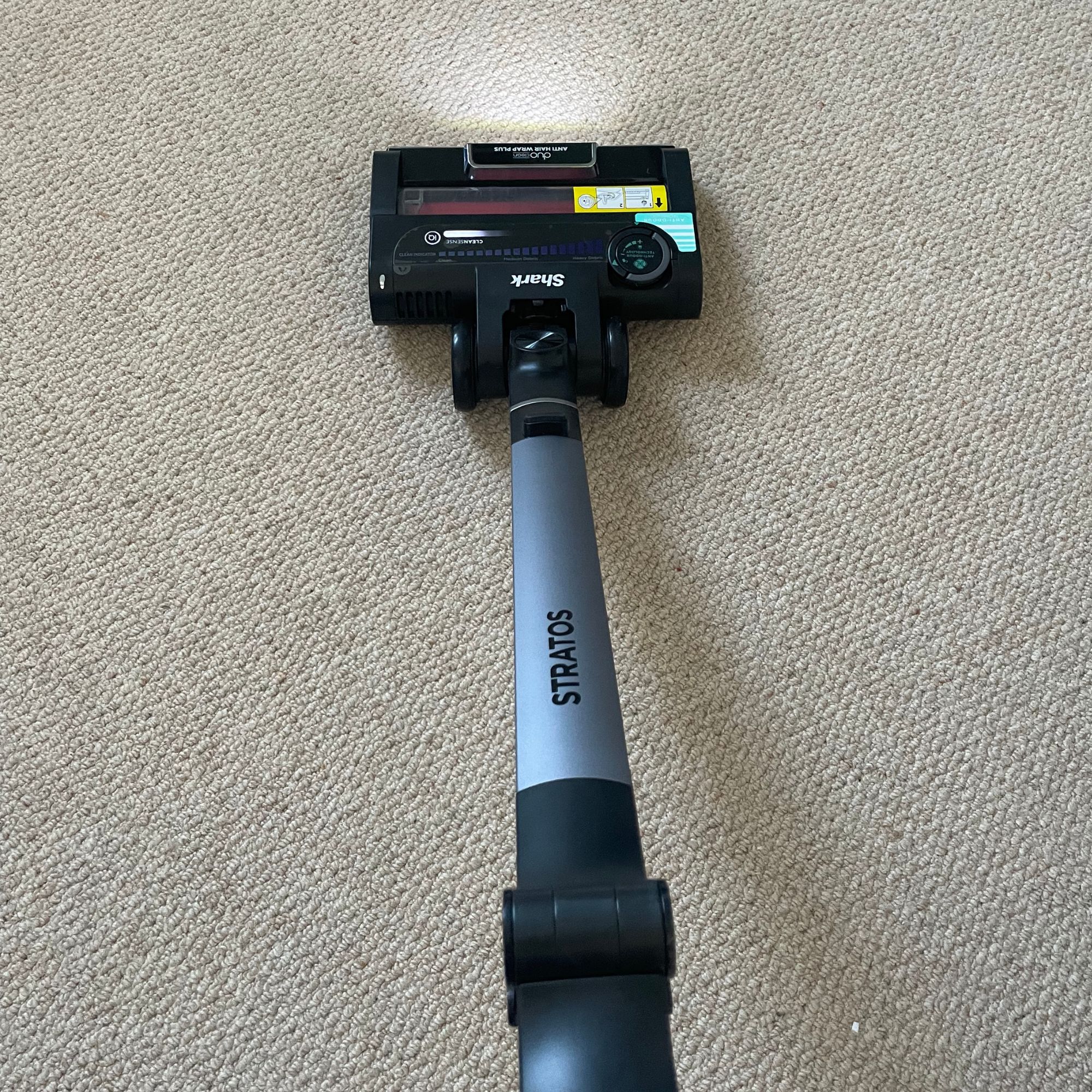 Shark Stratos Cordless Vacuum  vacuuming beige loop pile wool carpets