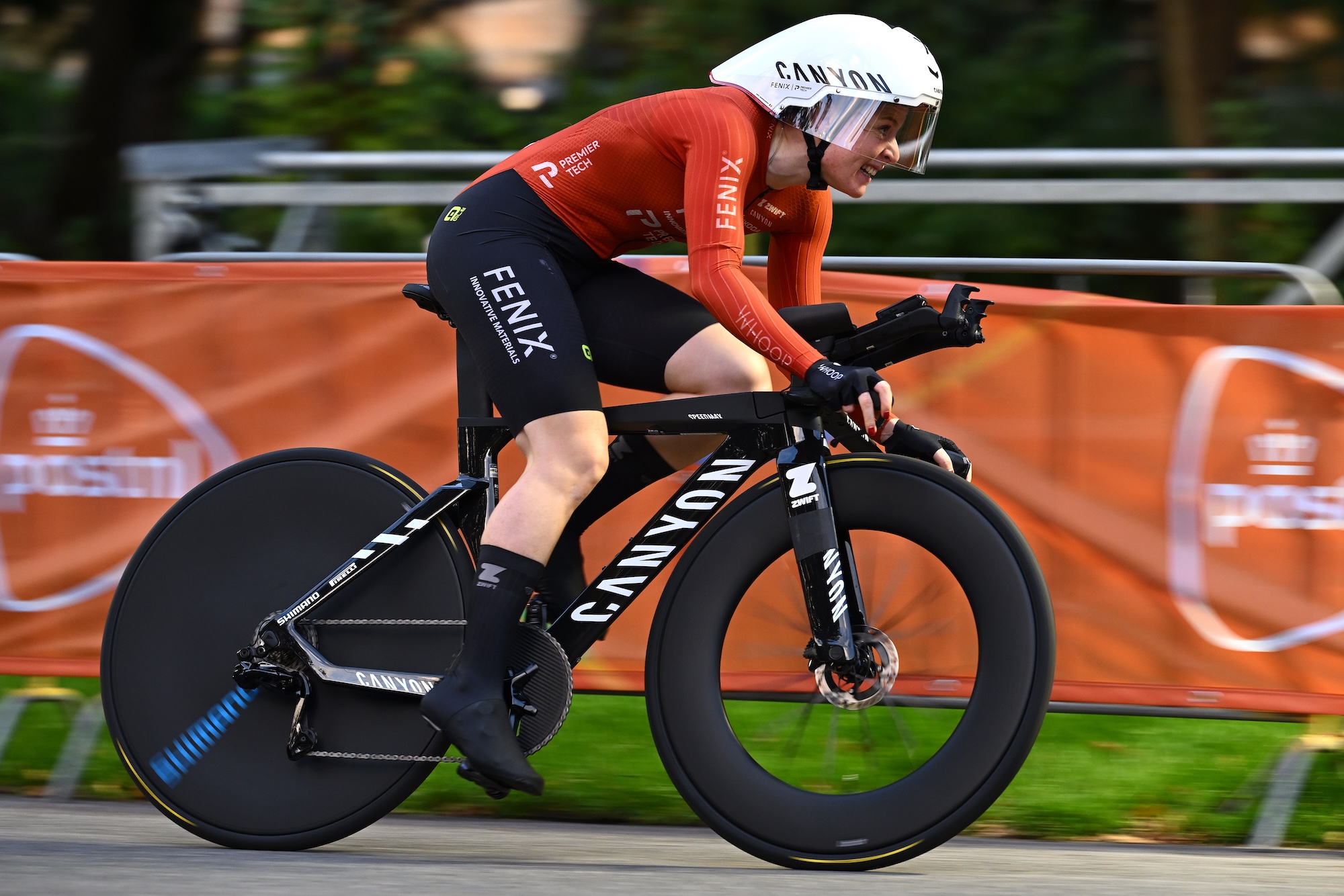 Charlotte Kool of Netherlands and Team Picnic PostNL rides to second place