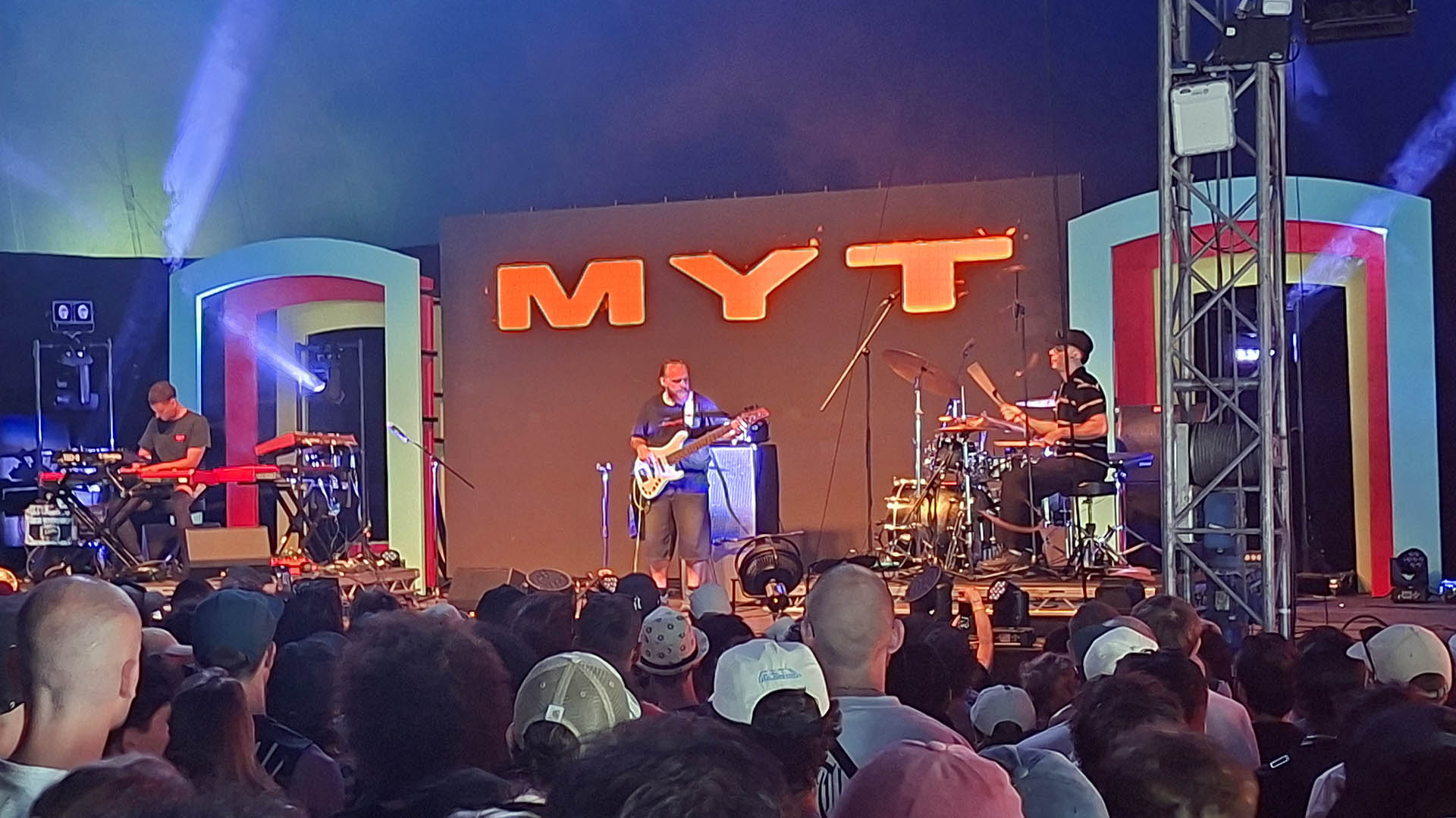A photo of MYT playing live.