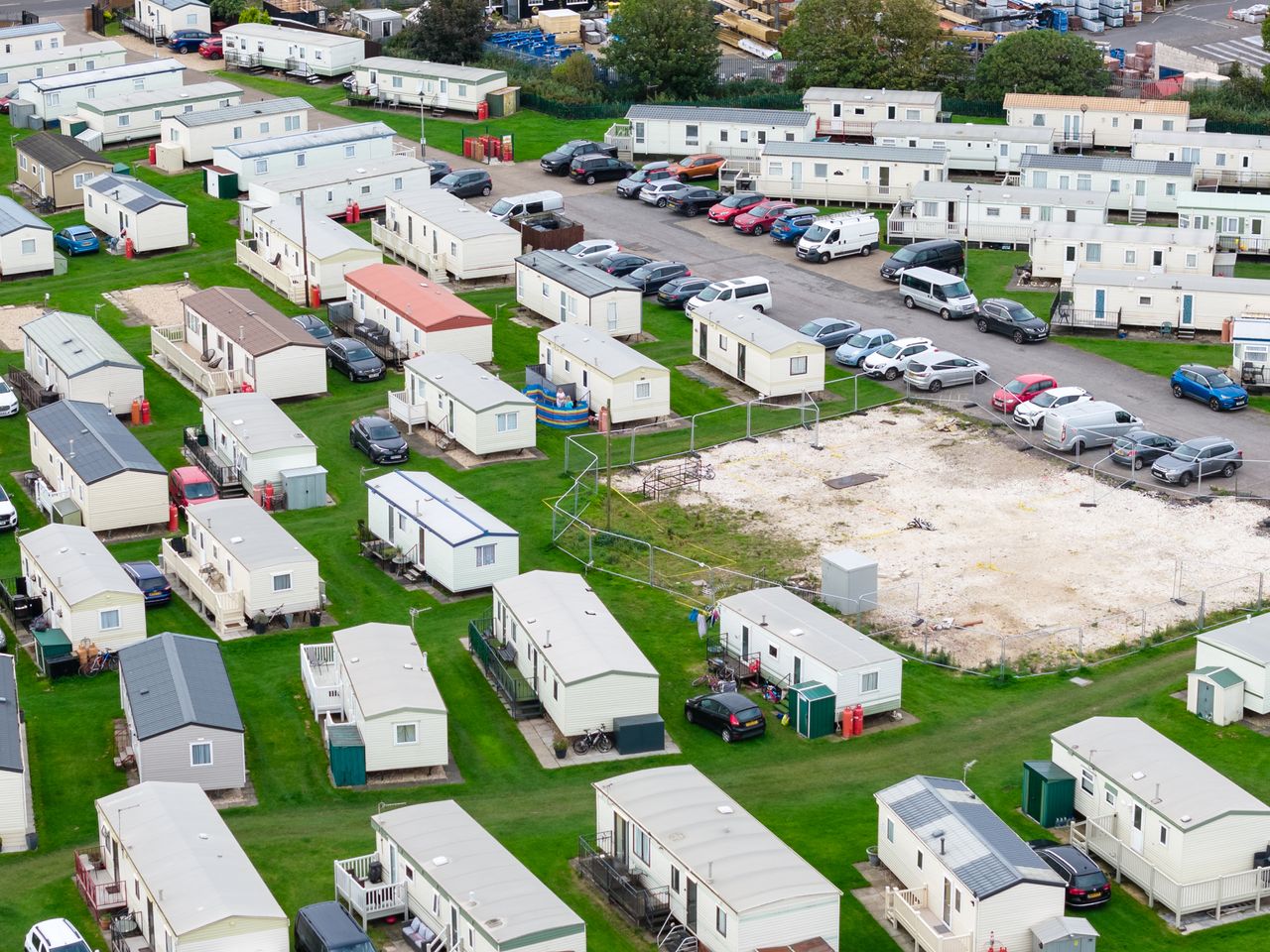 Image taken by DJI Air 3 (a camera drone). Here we see a closer overhead view of a mobile home park.