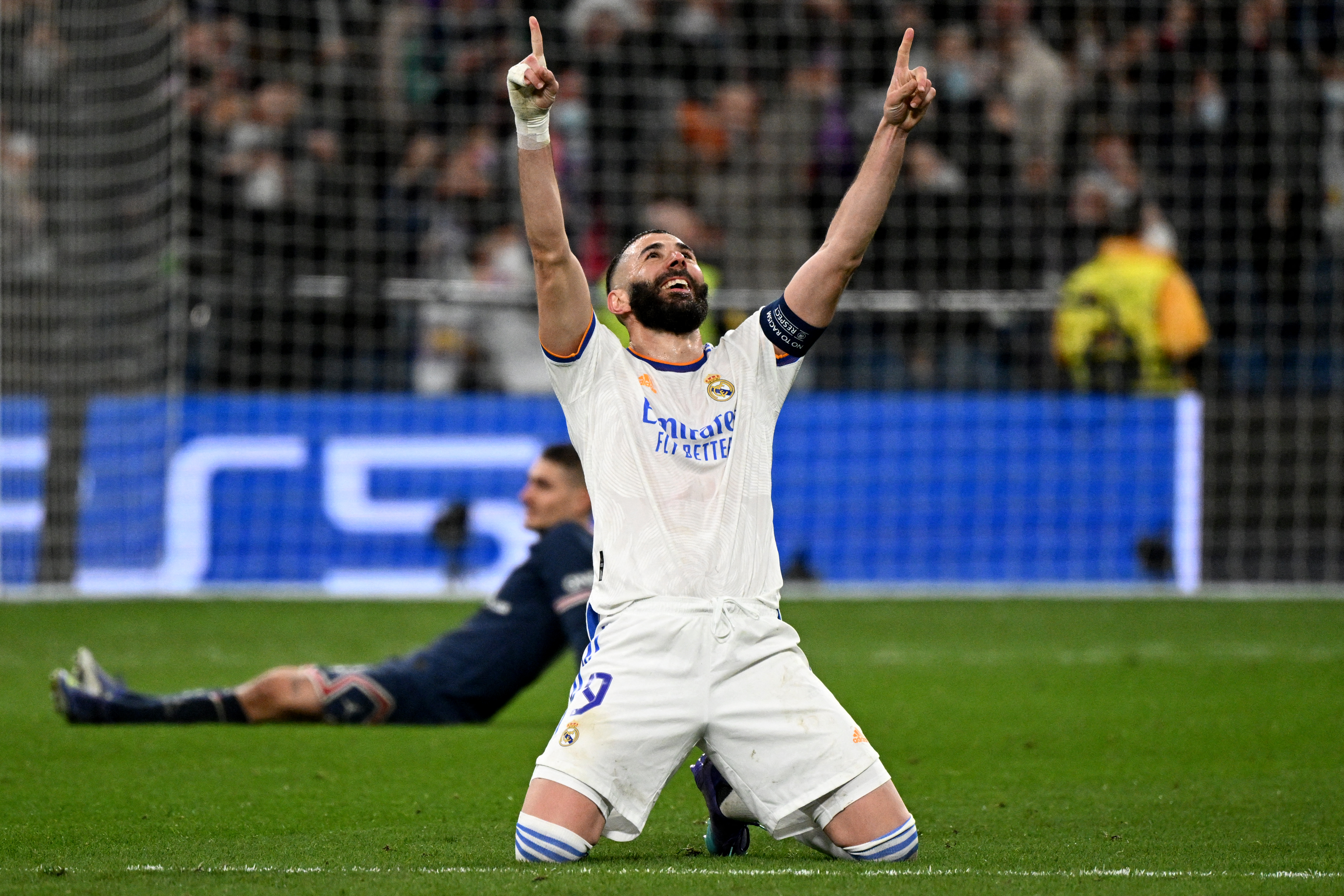 Karim Benzema celebrates after scoring for Real Madrid against Paris Saint-Germain in the Champions League in March 2022.