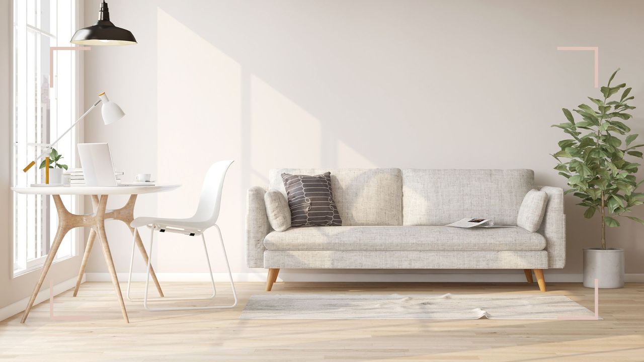 neutral living room with white sofa and dining table with white skirting boards to support an article for how to clean skirting boards most efficiently 