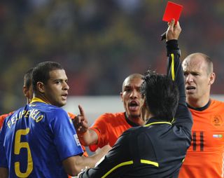 Brazil's Felipe Melo is sent off for stamping on the Netherlands' Arjen Robben in the team's 2010 World Cup quarter-final.