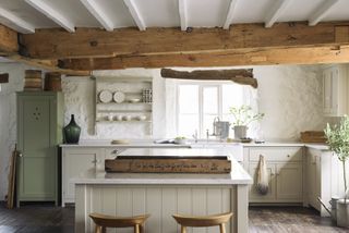 devol shaker kitchen with wooden beams and classic style