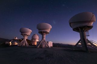 The BlackGEM array, consisting of three new telescopes at the European Southern Observatory’s La Silla Observatory in Chile, has begun operations. This photograph shows the three open domes of the BlackGEM telescopes, with three other telescopes at La Silla visible in the background.