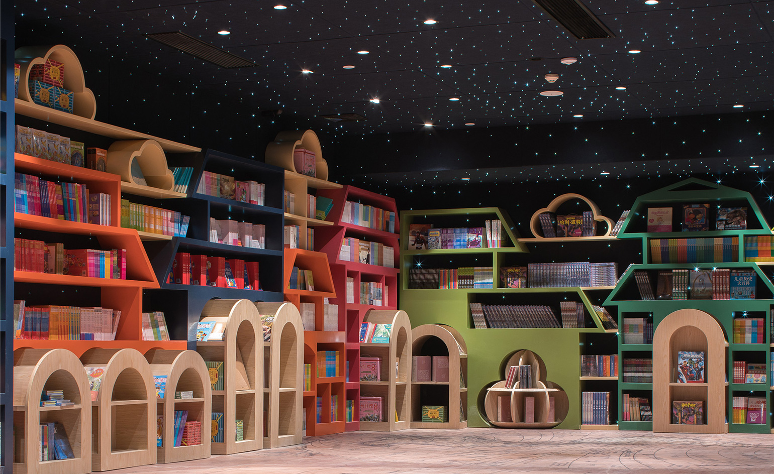 colourful shelves in the shape of houses and towers
