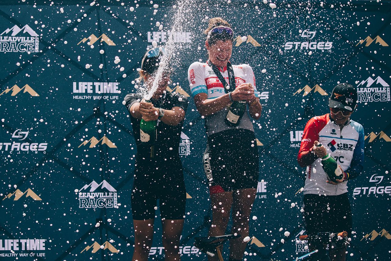 Pro Women's winner Rose Grant atop the podium
