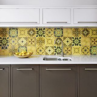 retro kitchen with tiled splashback and brown cabinetry