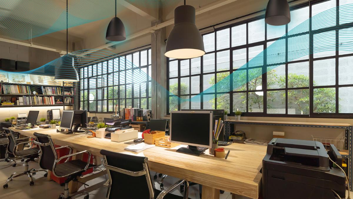 A conference room using high-tech loudspeakers for hybrid work.