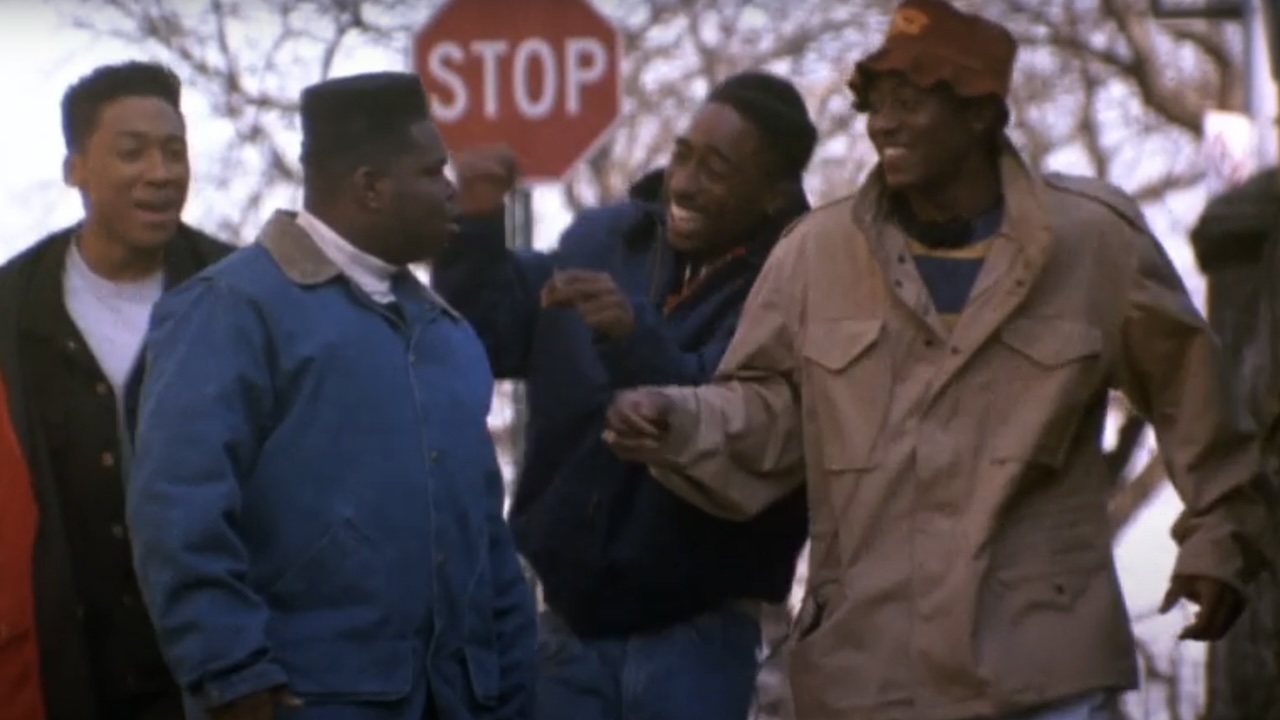 the characters from Juice walking down the street together.