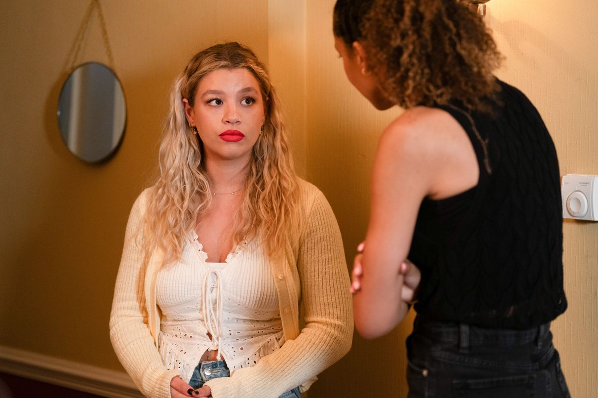 Anna Knight being confronted by her sister Gina Knight by the back stairs in the Queen Vic