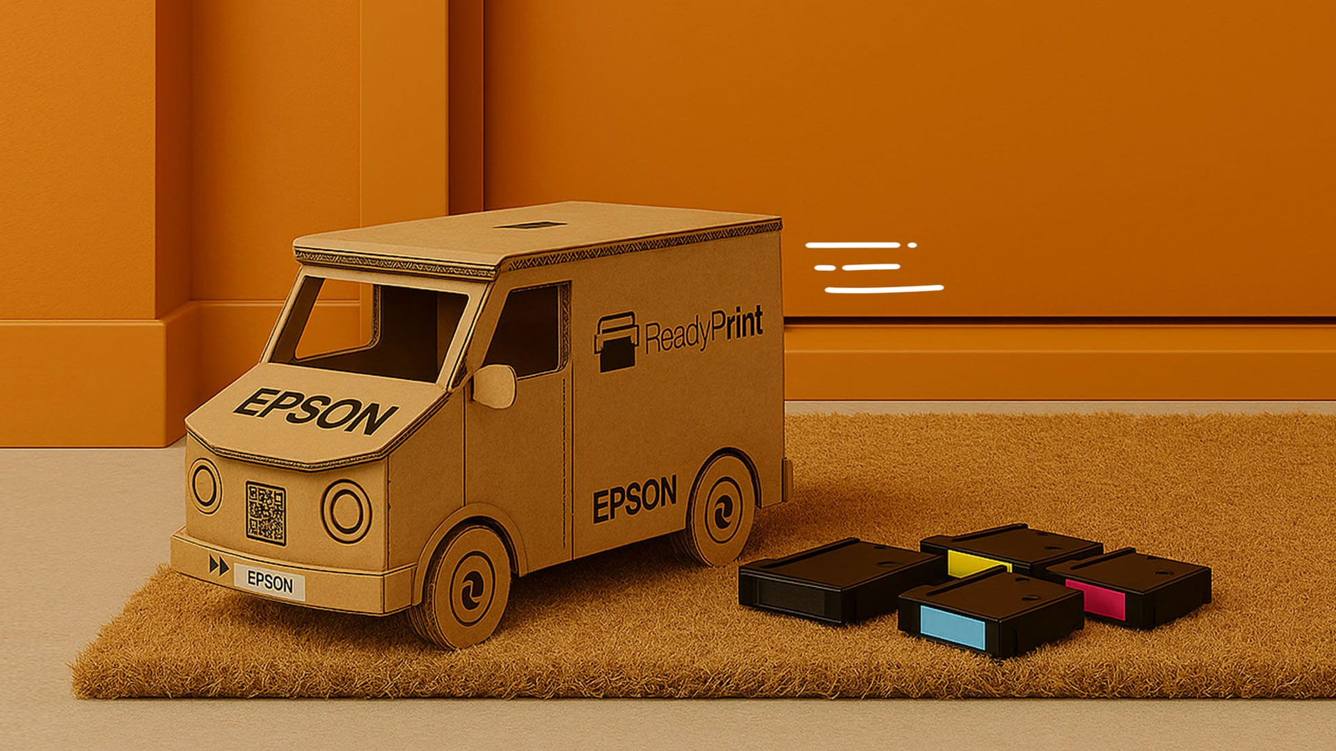 A cardboard delivery van on a doormat with Epson ink cartridges