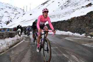 LAGHI DI CANCANO ITALY OCTOBER 22 Joao Almeida of Portugal and Team Deceuninck QuickStep Pink Leader Jersey Passo dello Stelvio Stilfserjoch 2758m Snow during the 103rd Giro dItalia 2020 Stage 18 a 207km stage from Pinzolo to Laghi di Cancano Parco Nazionale dello Stelvio 1945m girodiitalia Giro on October 22 2020 in Laghi di Cancano Italy Photo by Tim de WaeleGetty Images