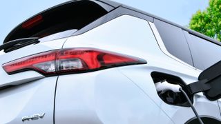 A close-up of the rear and charging port of the Mitsubishi Outlander PHEV