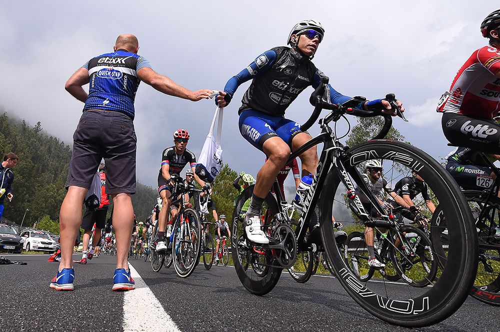 Maxime Bouet picks up lunch during stage 5 at the Vuelta