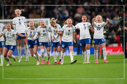 Why aren't the Lionesses wearing white shorts as illustrated by the Lionesses in blue shorts celebrating a win