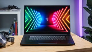 An image of the Razer Blade 17 (2022) from the front with a vivid desktop background