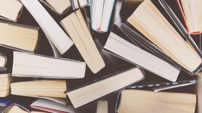 High Angle View Of Books On Table