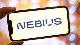 The Nebius logo is seen displayed on a smartphone screen