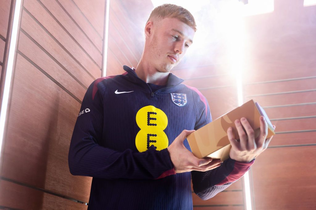 Cole Palmer of England poses for a photo with the award for England Senior Men&#039;s Player of the Year at St Georges Park on October 08, 2024 in Burton-upon-Trent, England.