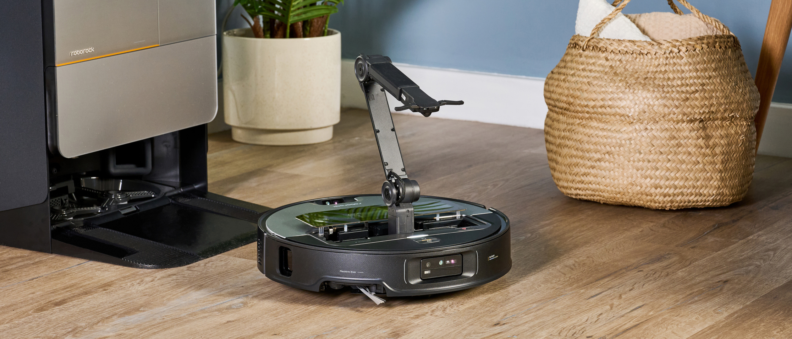 Roborock Saros Z70 robot vacuum with its arm out