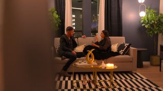 Nick and Vanessa sit and face each other on a couch in their apartment, in episode 3 of THE ULTIMATUM: MARRY OR MOVE ON.