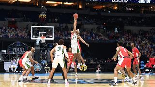 The Baylor Bears and the Houston Cougars tip off to begin their Final Four semifinal game of the 2021 NCAA Men's Basketball Tournament at Lucas Oil Stadium on April 3, 2021 in Indianapolis, Indiana.