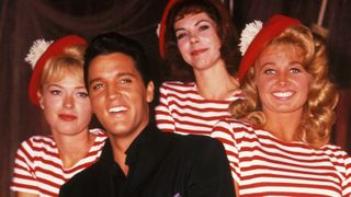 Elvis Presley with some of the cast of his 1962 film GIRLS, GIRLS, GIRLS