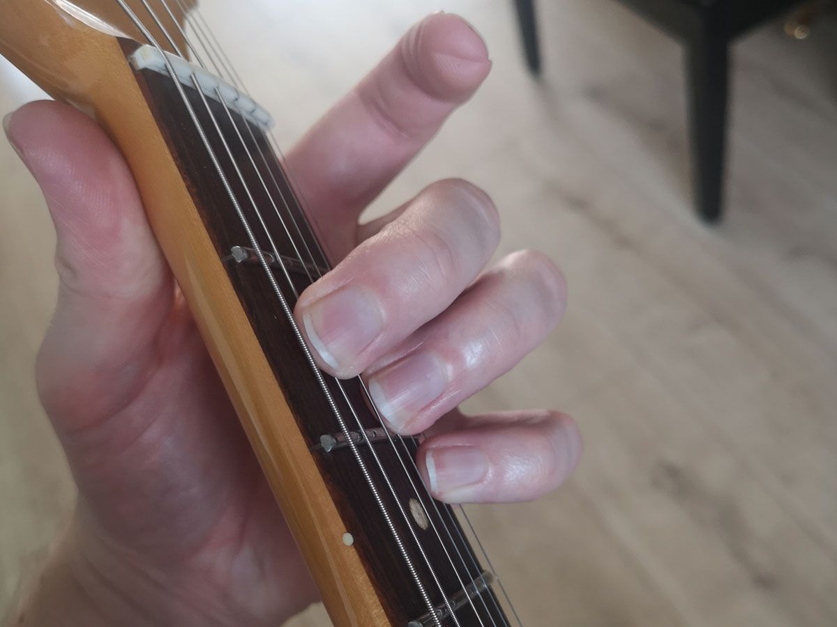A demonstration of how to play the open B minor 7 (Bm7) on guitar