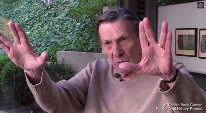 Leonard Nimoy explains where the famous Vulcan greeting came from