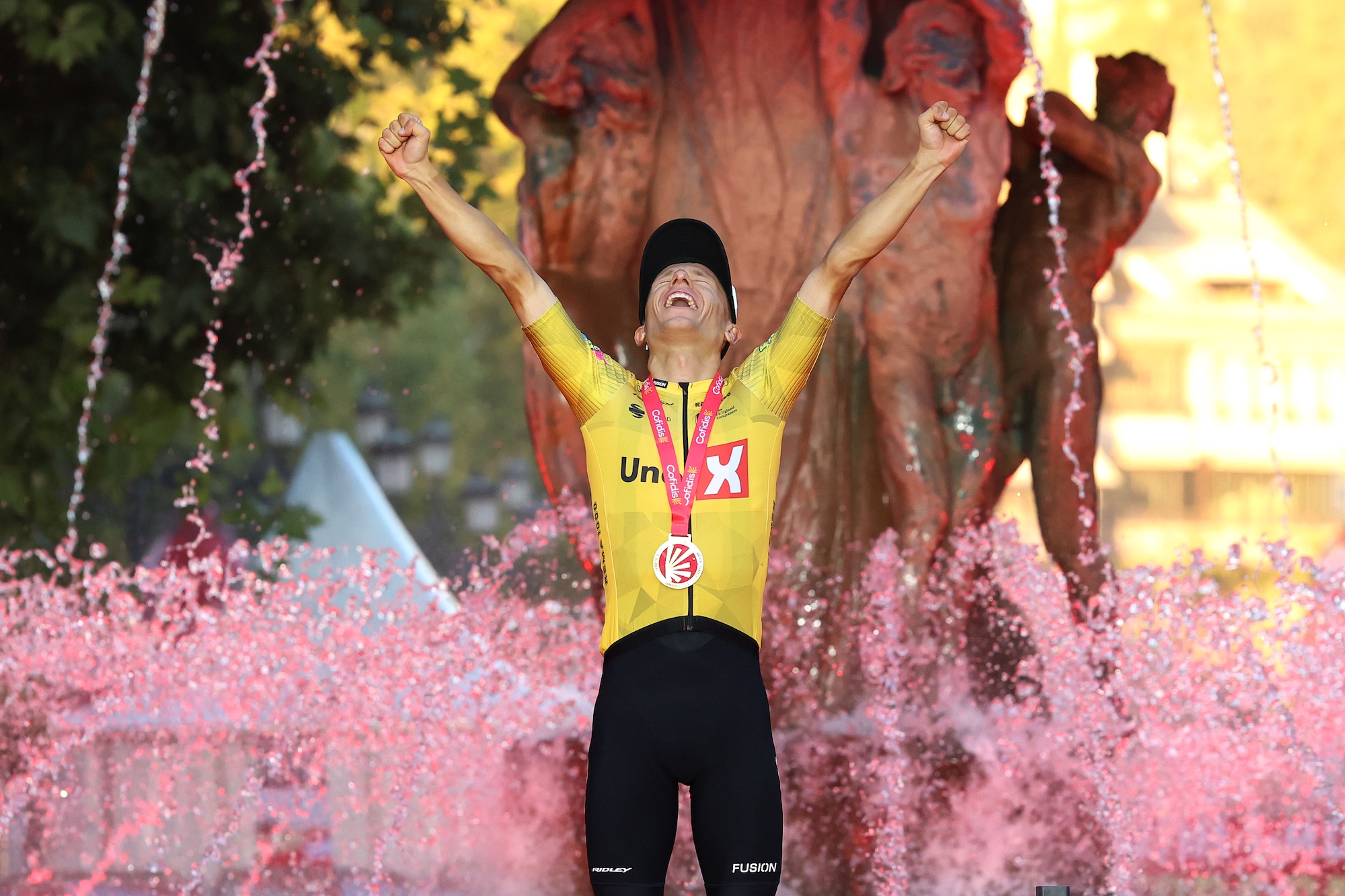 Tobias Halland Johannessen celebrates winning stage 21