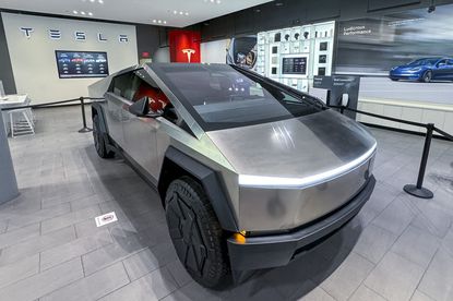 A Tesla Cybertruck at a Tesla store in San Jose, California, US, on Tuesday, Nov. 28, 2023. The first Cybertruck customers will receive the vehicles during a launch event at Tesla's Austin headquarters this week. Photographer: David Paul Morris/Bloomberg