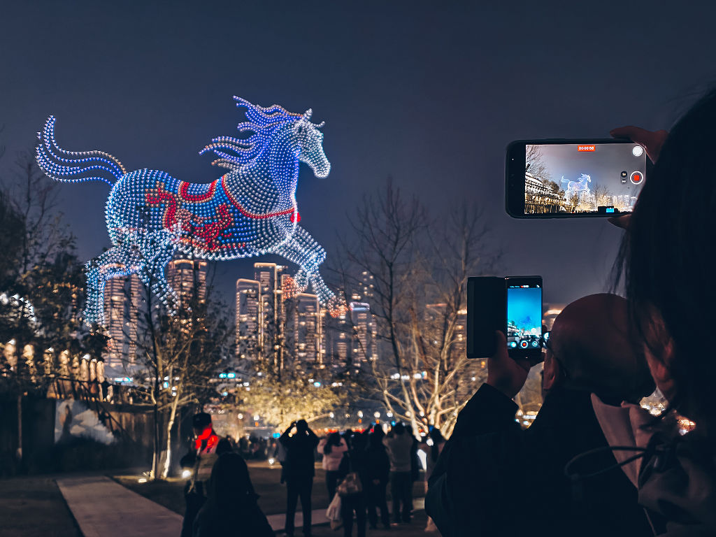 The special Spring Festival drone show lights up the night sky on February 16, 2026 in Chongqing, China.