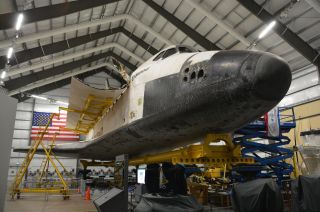 Special NASA equipment was needed to open and support the opening of the retired space shuttle Endeavour's cargo bay doors at the California Science Center in Los Angeles.