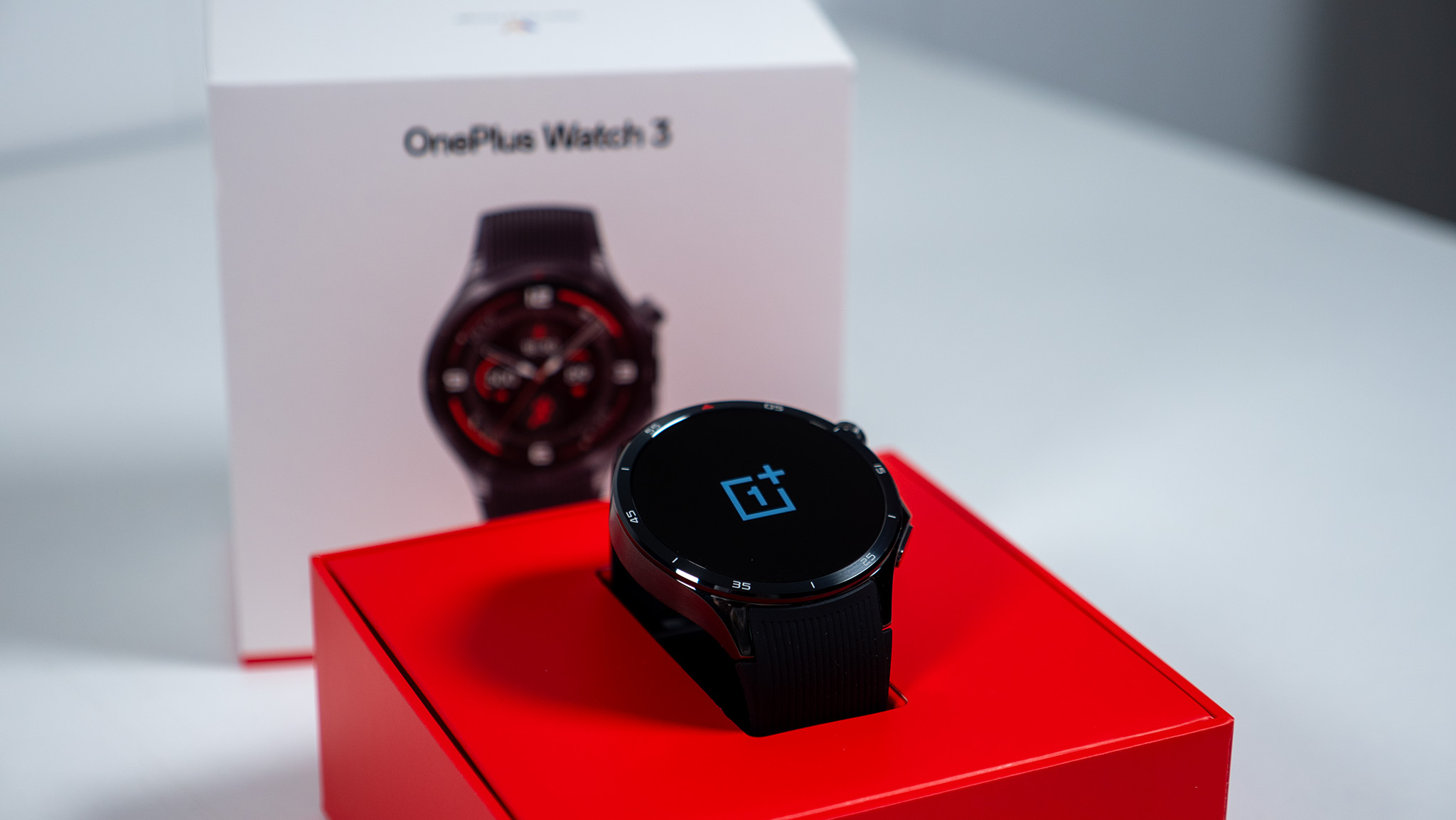 The OnePlus Watch 3 with its box