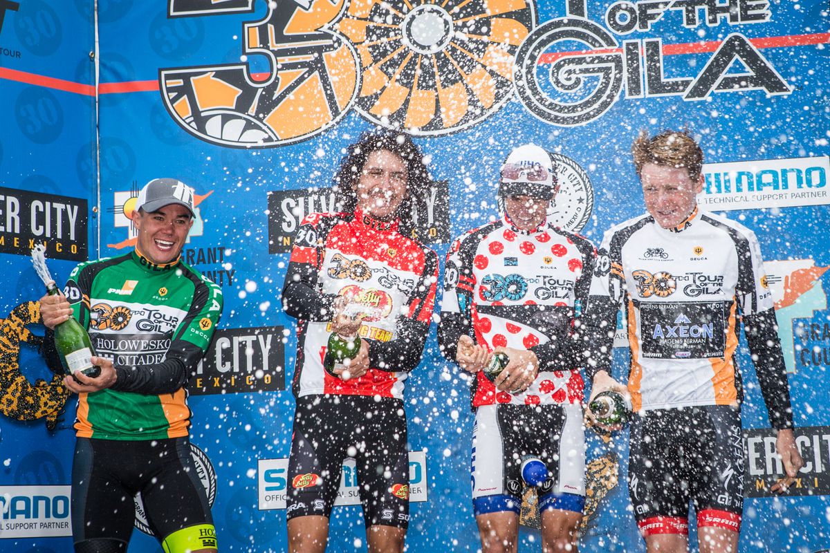 Champagne flies for the overall jersey winners