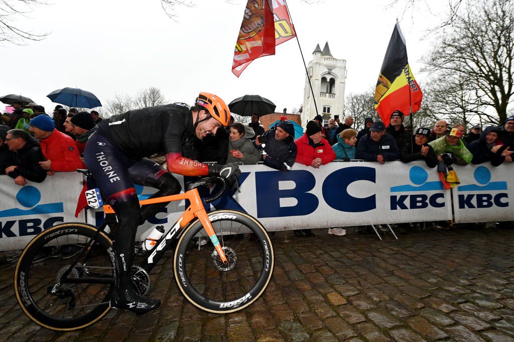 WEVELGEM BELGIUM MARCH 26 Adam de Vos of Canada and Team Human Powered Health competes passing through a Kemmelberg cobblestones sector during the 85th GentWevelgem in Flanders Fields 2023 Mens Elite a 2609km one day race from Ypres to Wevelgem UCIWT on March 26 2023 in Wevelgem Belgium Photo by Tim de WaeleGetty Images