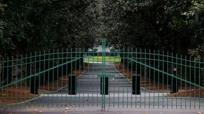 magnolia lane, augusta national with gates closed