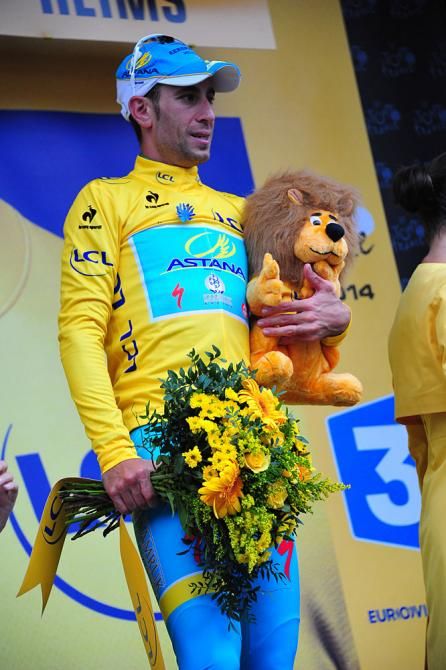 Vincenzo Nibali (Astana) on the podium with the lion