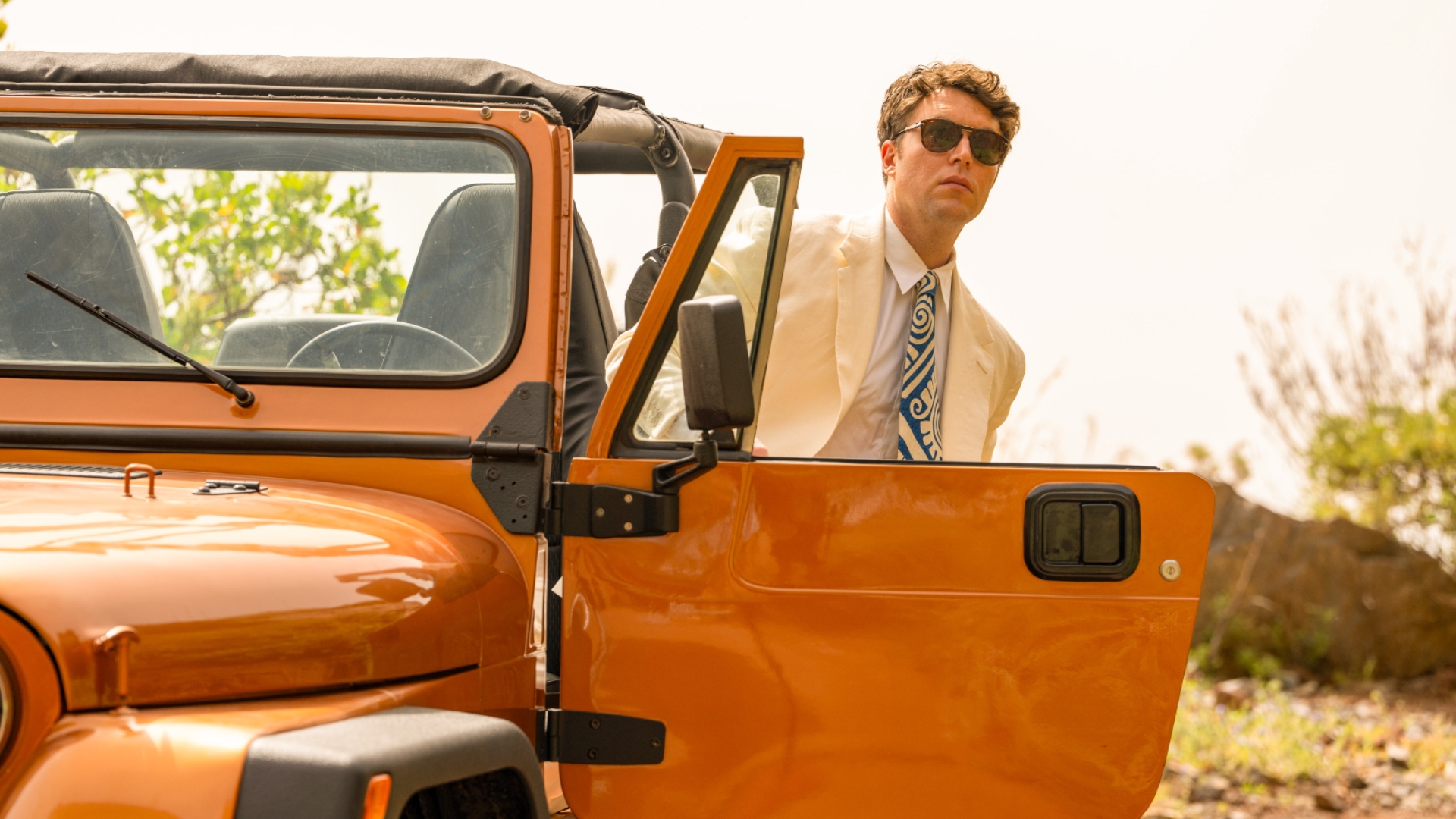 Logan steps out of his car in The Gold season 2