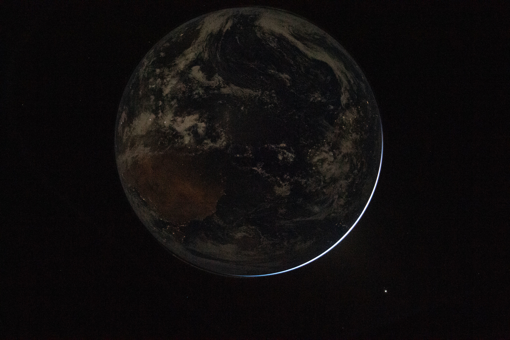 The surface of the Earth, shot with the Nikon D5 from the Orion spacecraft.