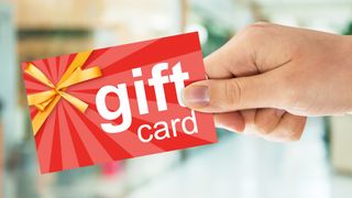 Generic gift card held in hand