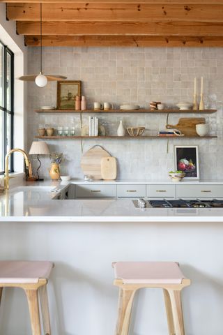 Kitchen with zeillige tiles and open shelving