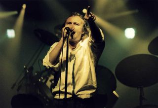 Phil Collins ionstage at Wembley in 1987
