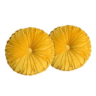 Two pairs of circular yellow cushions