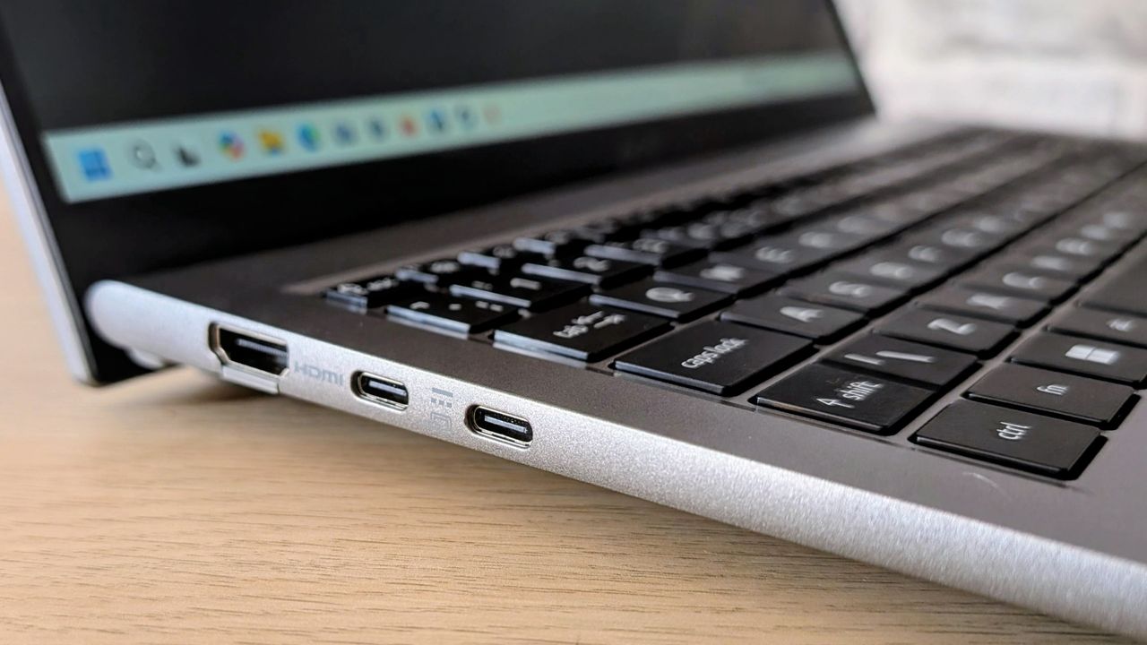 The Acer Aspire Go on the ITPro background