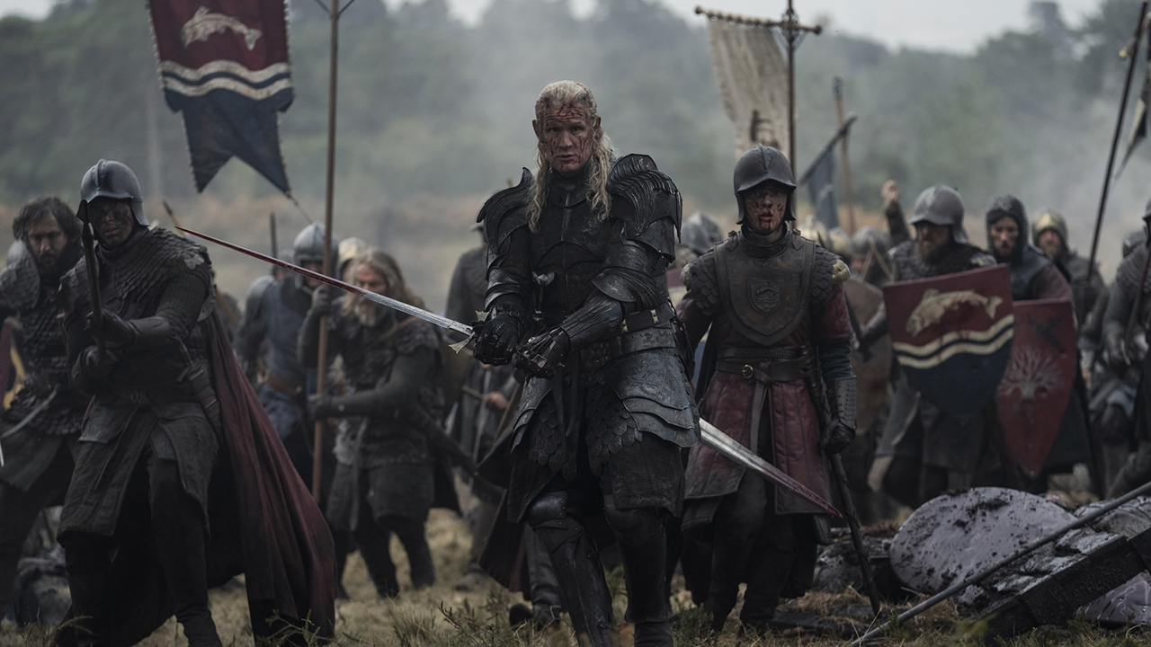 A bloody and muddy Daemon leading some soldiers forward in House of the Dragon season 3